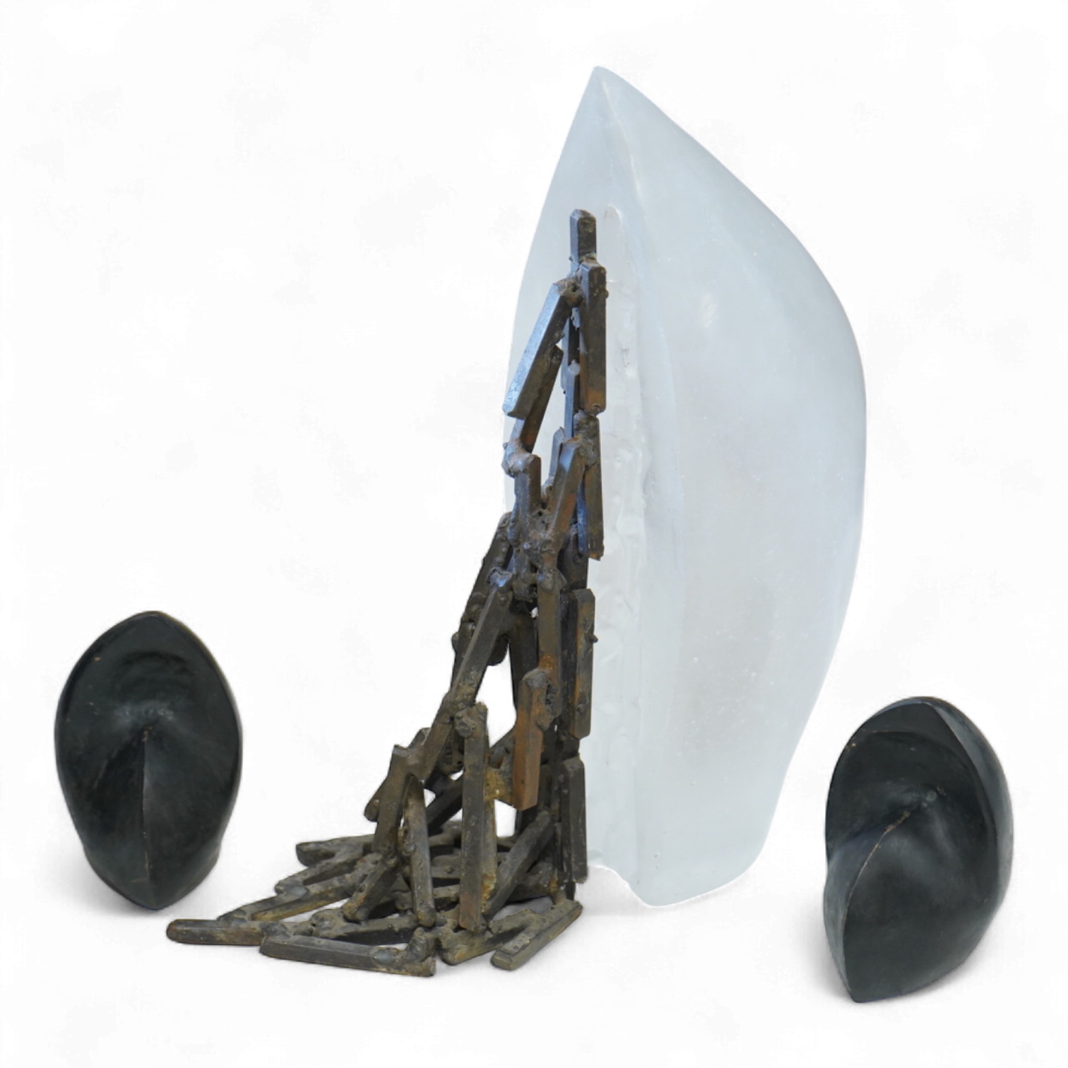 A contemporary Brutalist style glass and iron sculpture and two bronzes signed 'VA', 27cm